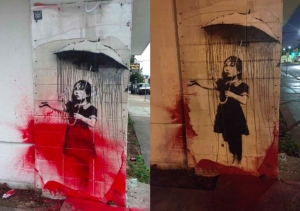 Banksy - Umbrella Girl vandalized